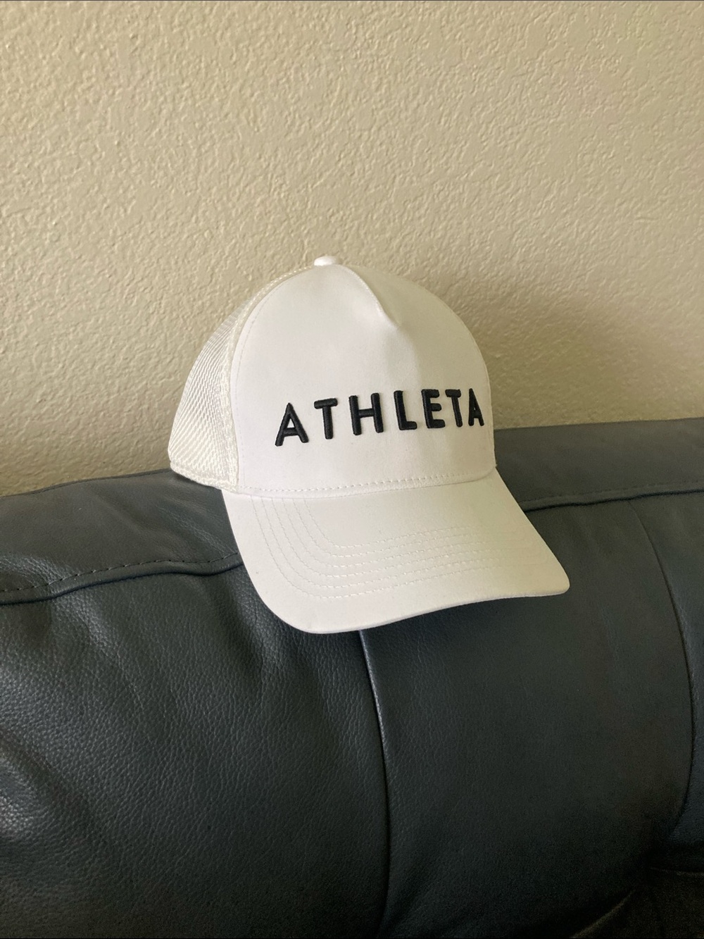 Athleta White Trucker Cap with Black Logo